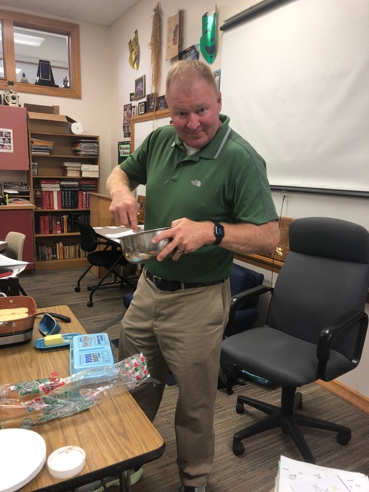 Mr. Ockander whisks while making French Toast!